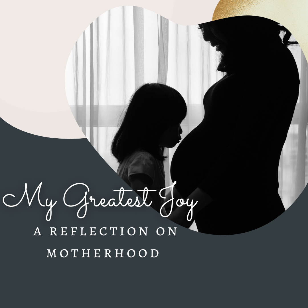 My Greatest Joy: A Reflection on Motherhood / A picture of a little girl kissing her mother's pregnant belly