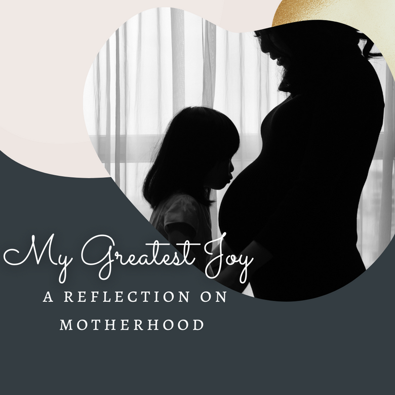 My Greatest Joy: A Reflection on Motherhood / A picture of a little girl kissing her mother's pregnant belly